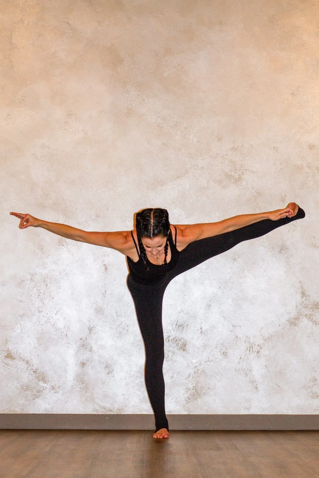 Heather in a standing balance yoga posture